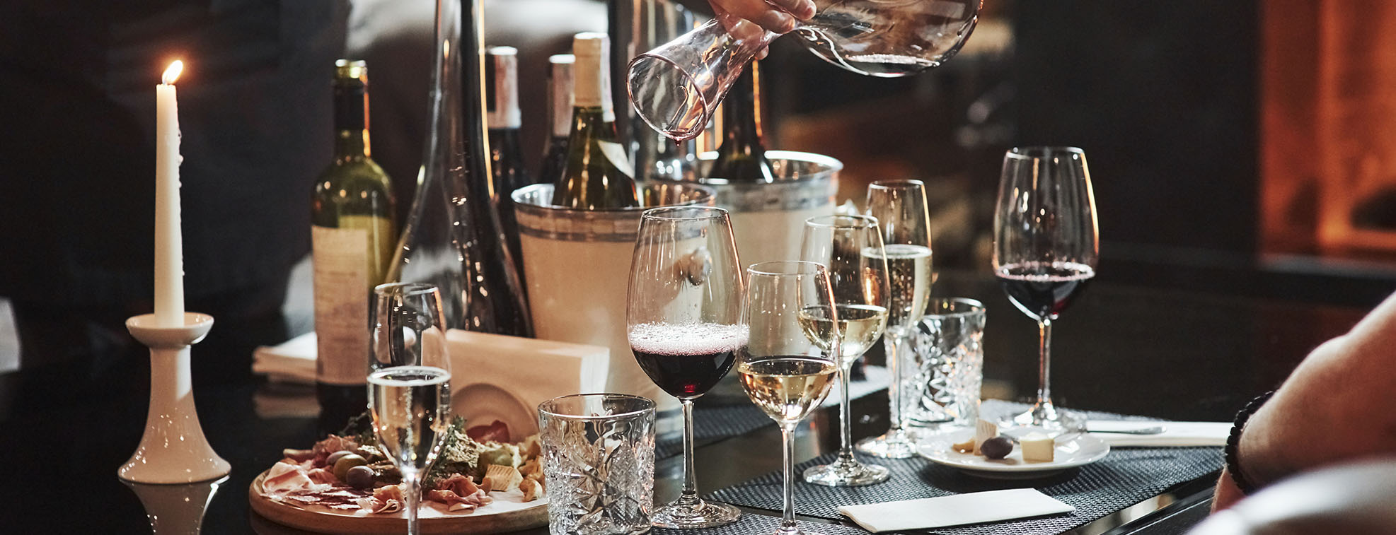 A set of different beverages in beautiful glasses at a restaurant 